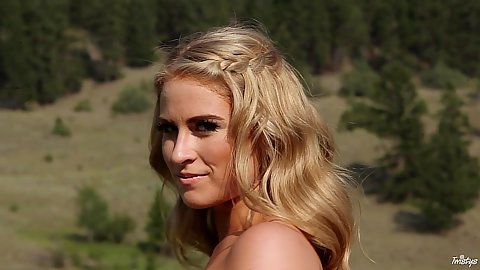 Solid blonde Maya Rae is a naked babe in nature