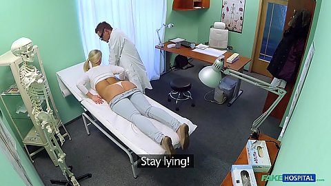 Pulled down pants blond getting her ass examined by doctor