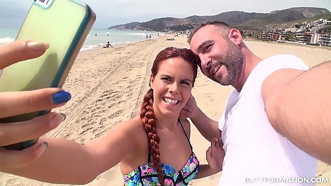 Gala Brown taking a selfie on the beach with random guy