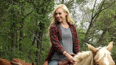Blonde girl on a horse likes riding on this cowboy style ranch story based feature film