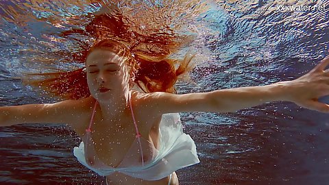 Very erotic diving and swimming the pool with exhilarating 18 year old redhead Alla Zlatavlaska getting naked by the end