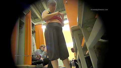 Chubby ass mature women getting naked in the womens locker room on hidden camera