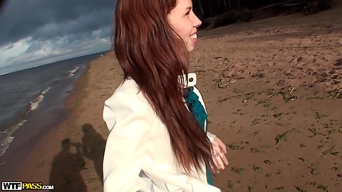 Outdoors on an empty beach with redhead teen gf Iva Zan flashing and playing with her pussy