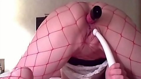 fireflame sits a dildo in her ass and a vibrator for the pussy