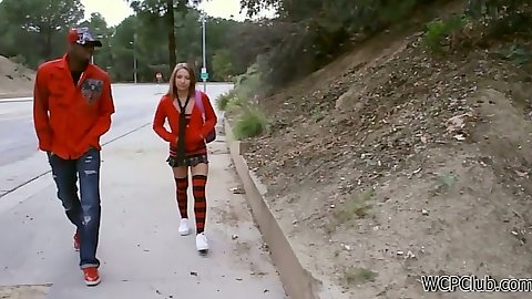 Young teen Alyssa Branch talking a walk on the street in school uniform picked up