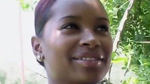 Ebony Cece outdoors wearing bra and fishnet seethrough shirt