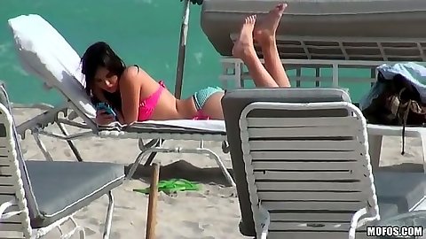 Natalie Heart public tanning by the beach outdoors