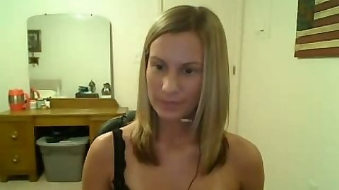 Cute blonde amateur takes off her bra and panties in webcam show