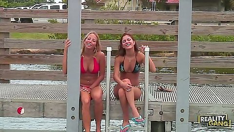 Bikini outdoor babes Ashley Jensen and Nicole Grey go on a boat