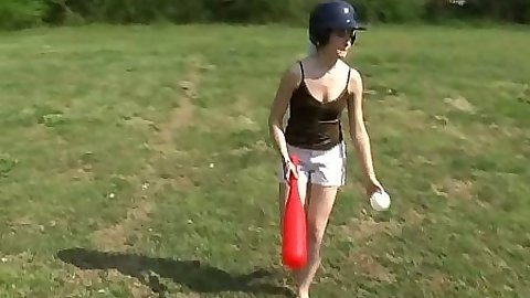 Outdoor baseball play with Kitty Karsen in shorts