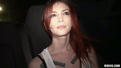 Redhead fully clothed Indigo Augustine flashing her tits