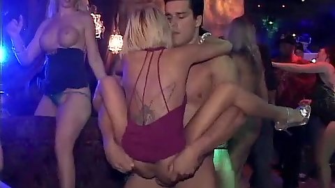Chick is in a club with no panties riding cock