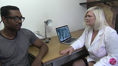 Doctor sex therapist granny Lacey Starr looking to see wha thte problem is with this mans large black cock