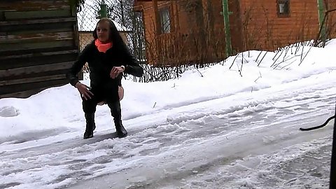 Alena couldnt hold it in any further she quickly sat down in teh middle of the road when nobody is there to take a piss