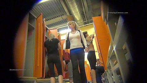 Hidden camera installed in the unsuspecting womens change room to watch them get naked and put on clothes
