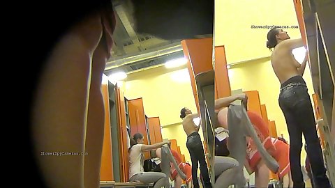 Spy on women and milfs with mature changing in the locker room taking off their pants