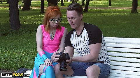 Spunky looking redhead Xenia likes to dress like a super hero and met men in parks