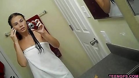 Sexy babe takes a video of her in teh bathroom