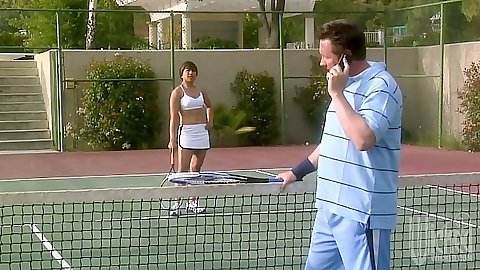 Outdoor tennis match with athletic Rayveness and a coach