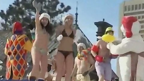 Dancing around in public during winter time with bikini girls