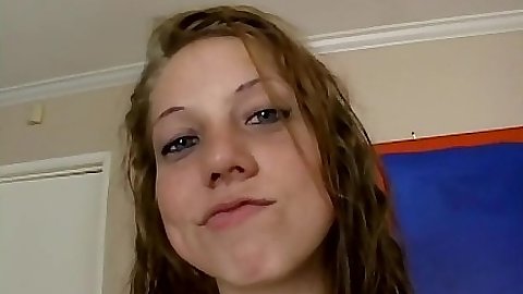 Nice looking teen Kara Bare smiles and sucks on camera